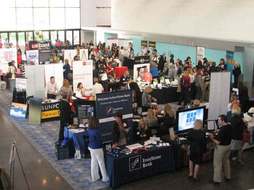 conference booths and people in event space